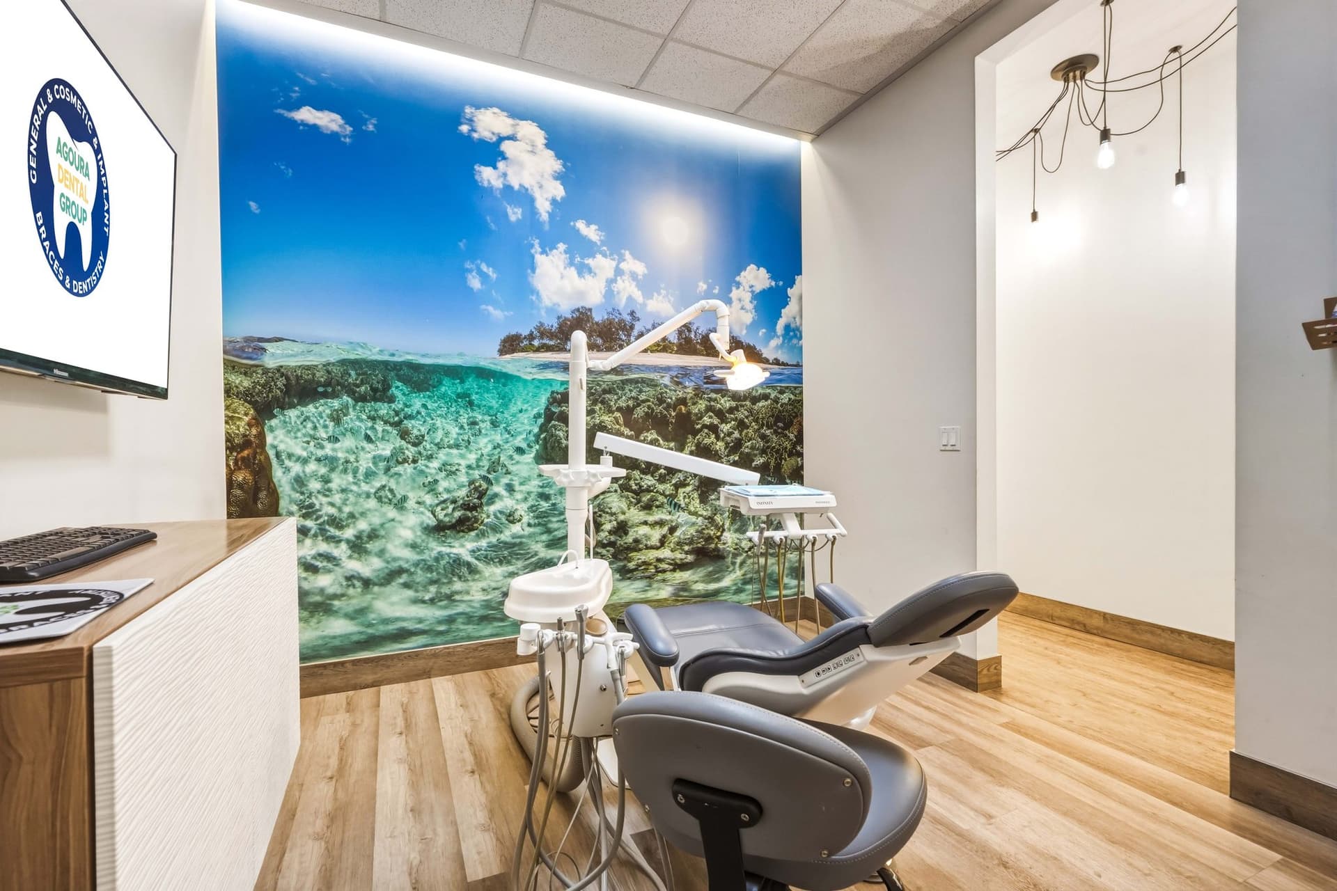 Treatment room with an ocean mural at Agoura Dental Group
